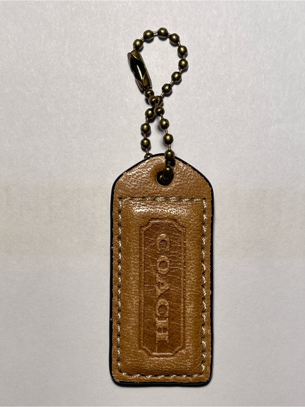 Coach Tan Leather Hang Tag with Brass Ball Chain and Contrast Stitching